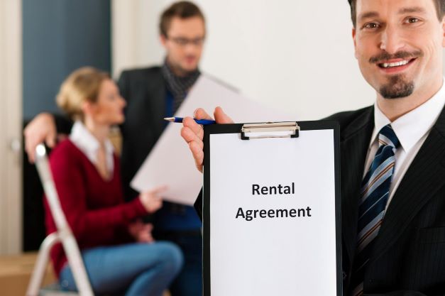 realtor showing rental agreement