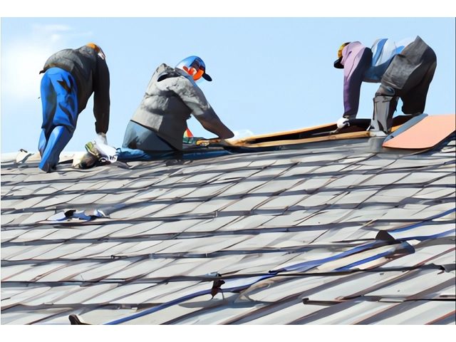 Roofer fixing roof